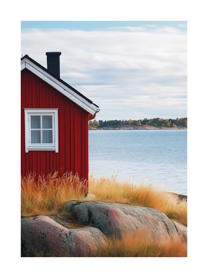 Poster of a red Swedish cabin by the sea with autumn grass and rocks