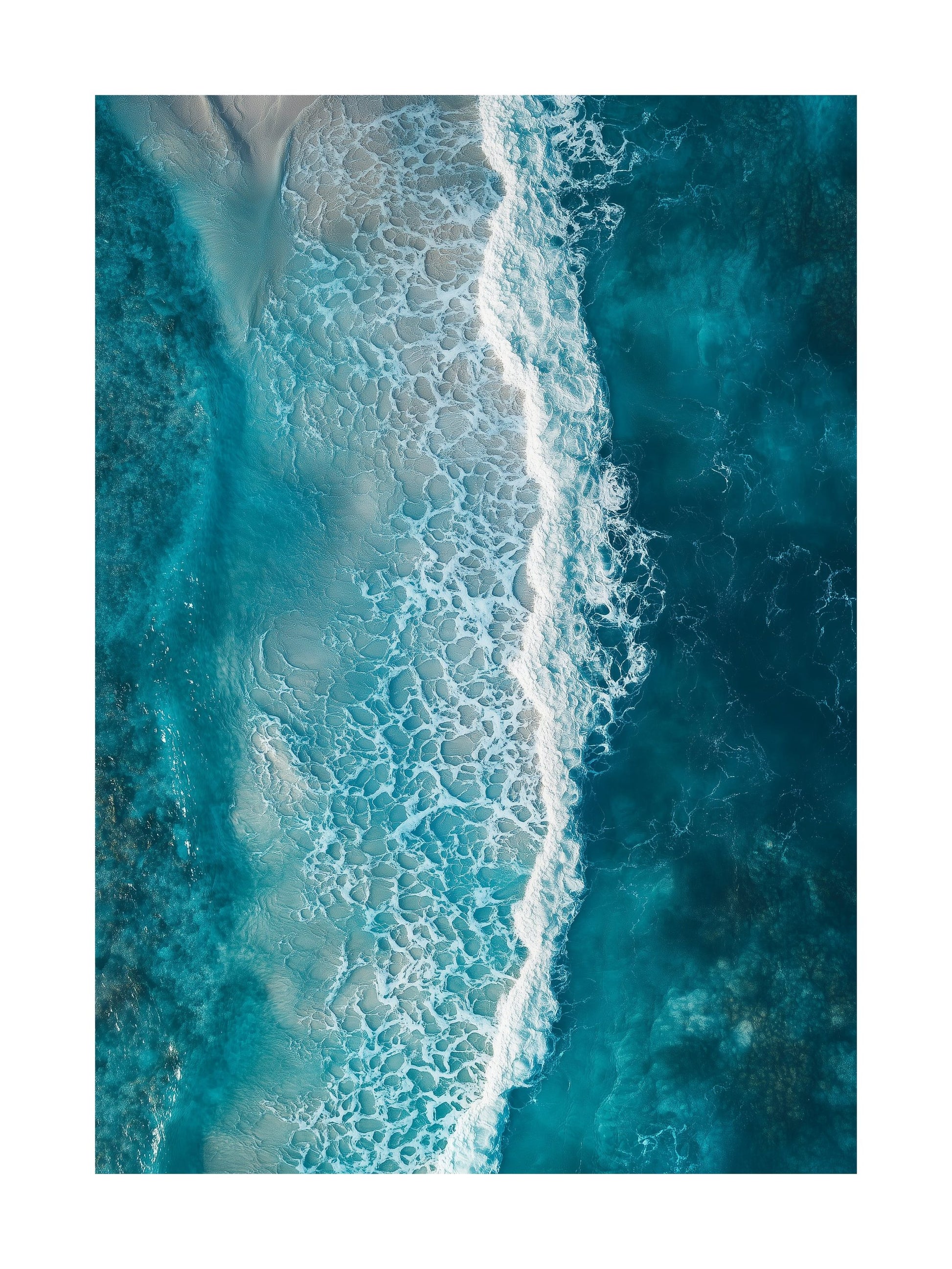 Aerial shot of sea waves rolling onto a sandy beach with stunning clarity. Ideal for wall art in your home, office, or studio.