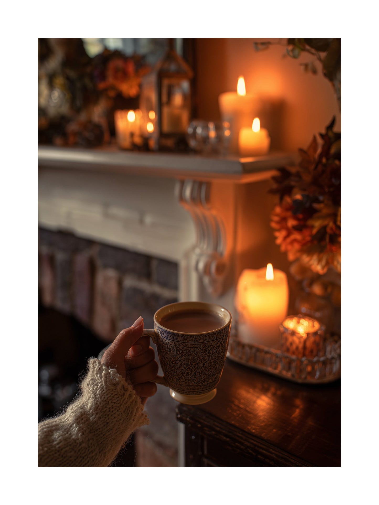 Poster of cozy evening by the fireplace with candles and tea