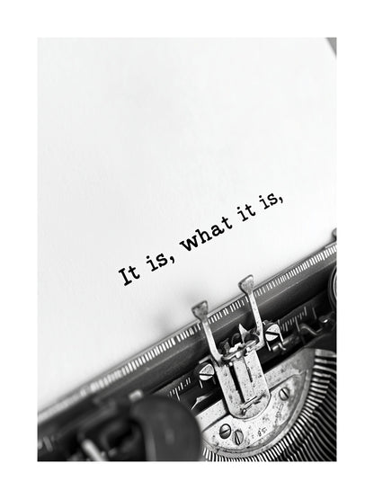 Black and white quote poster with 'It is what it is' typed on a typewriter