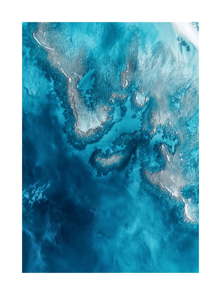 Top-down drone image of bright blue ocean with abstract reef patterns. Ideal for wall art in your home, office, or studio.